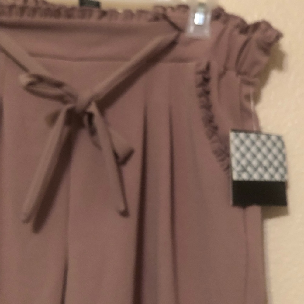 Rose color pants still have tags attached,never worn and comfortable fit